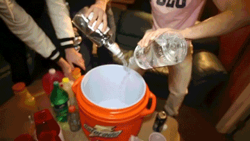 Pouring a bucket of drink